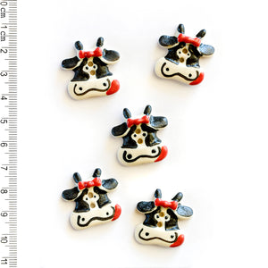 L144 Cow Buttons