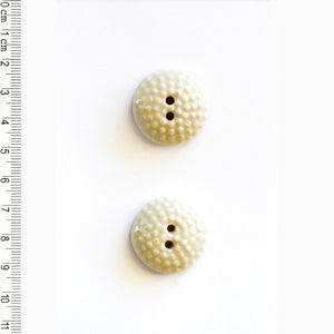 L588 Cream Raised Dot Buttons